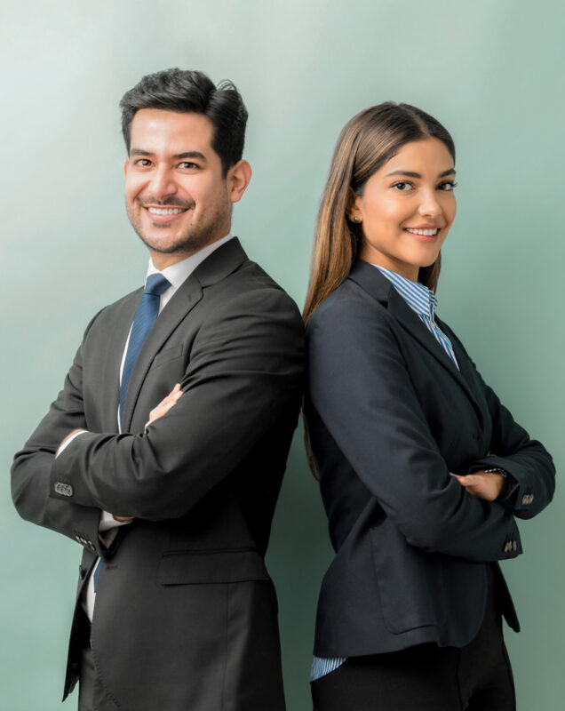 A couple of young accounting professionals dressed in social clothes